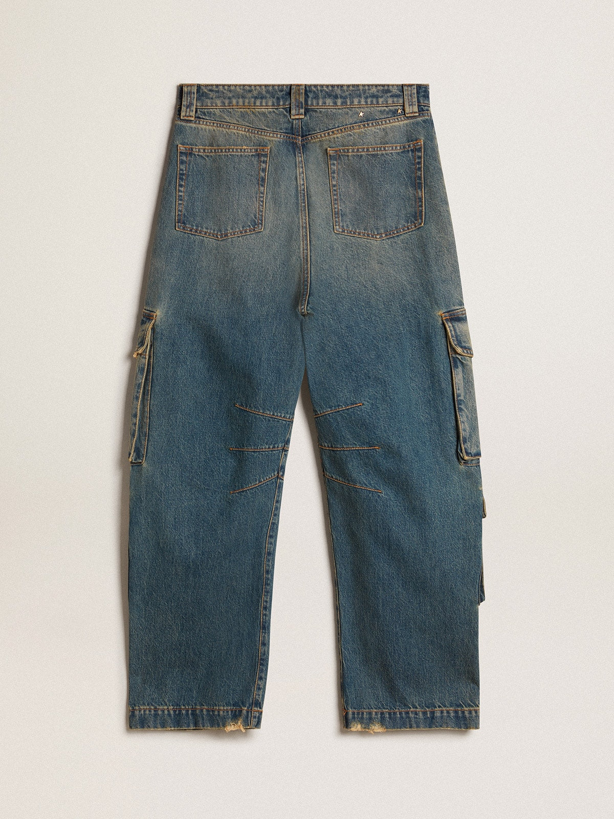 Blue jeans with a distressed finish
