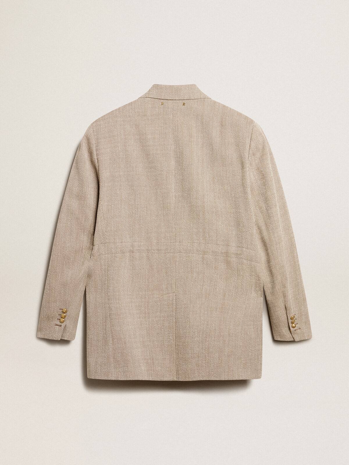 Women’s beige double-breasted blazer with button fastening