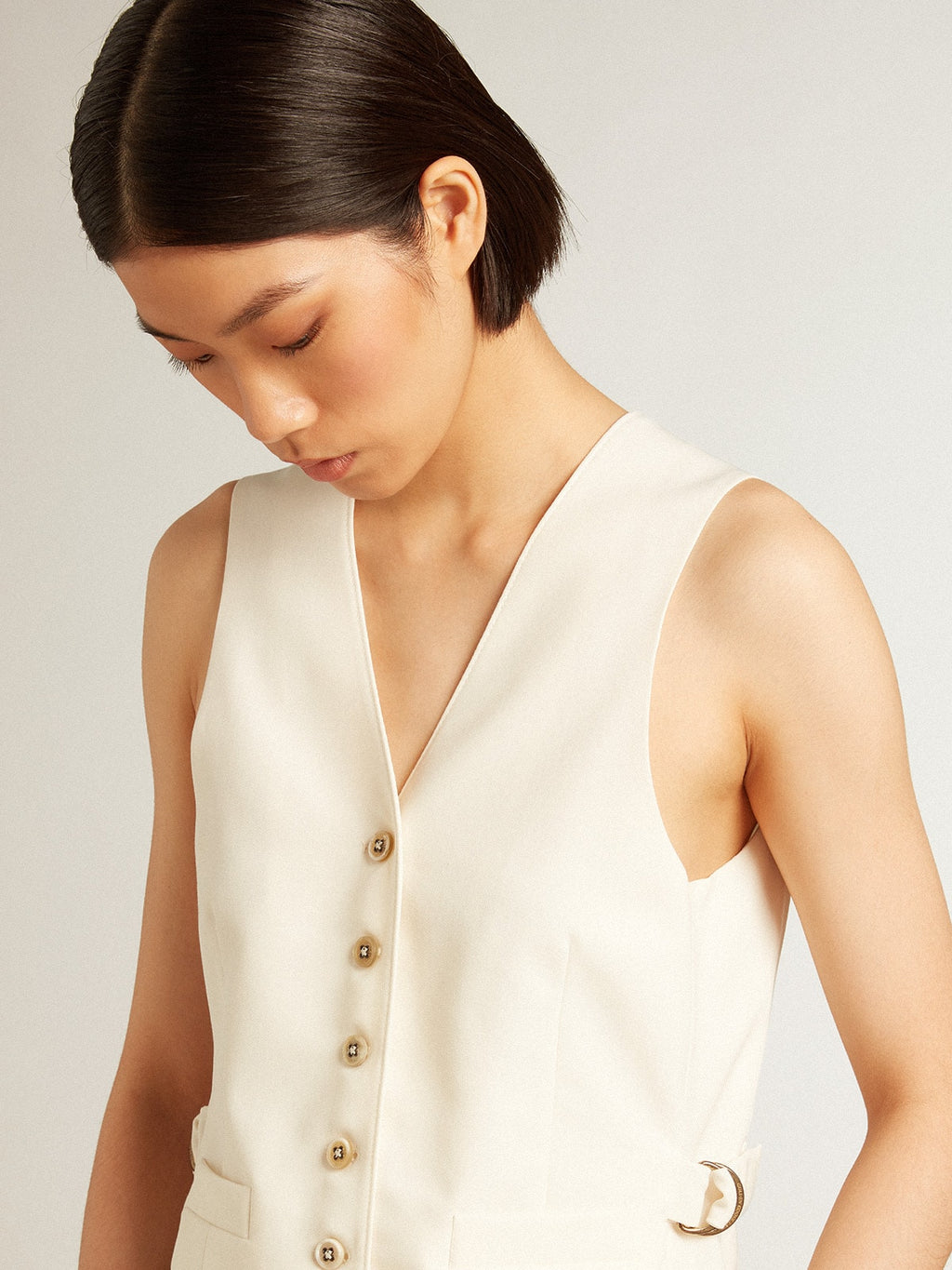 Women's aged white V-neck gilet