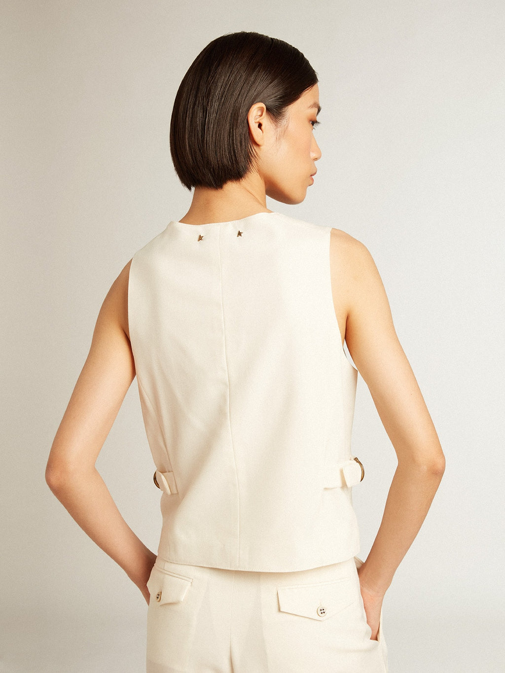 Women's aged white V-neck gilet