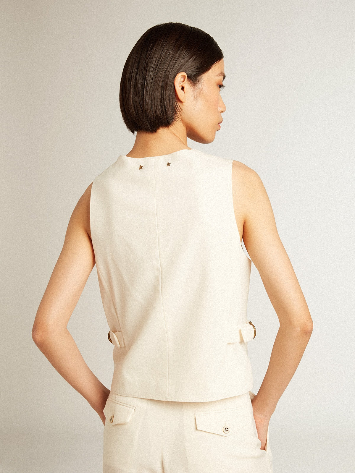 Women's aged white V-neck gilet