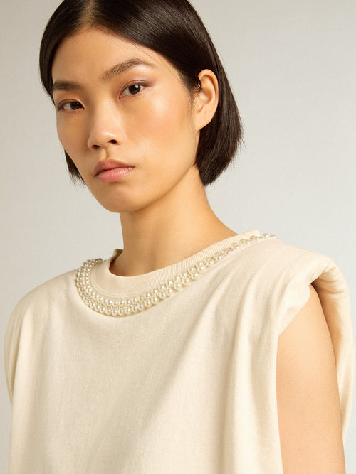 Aged white sleeveless T-shirt with pearl embroidery