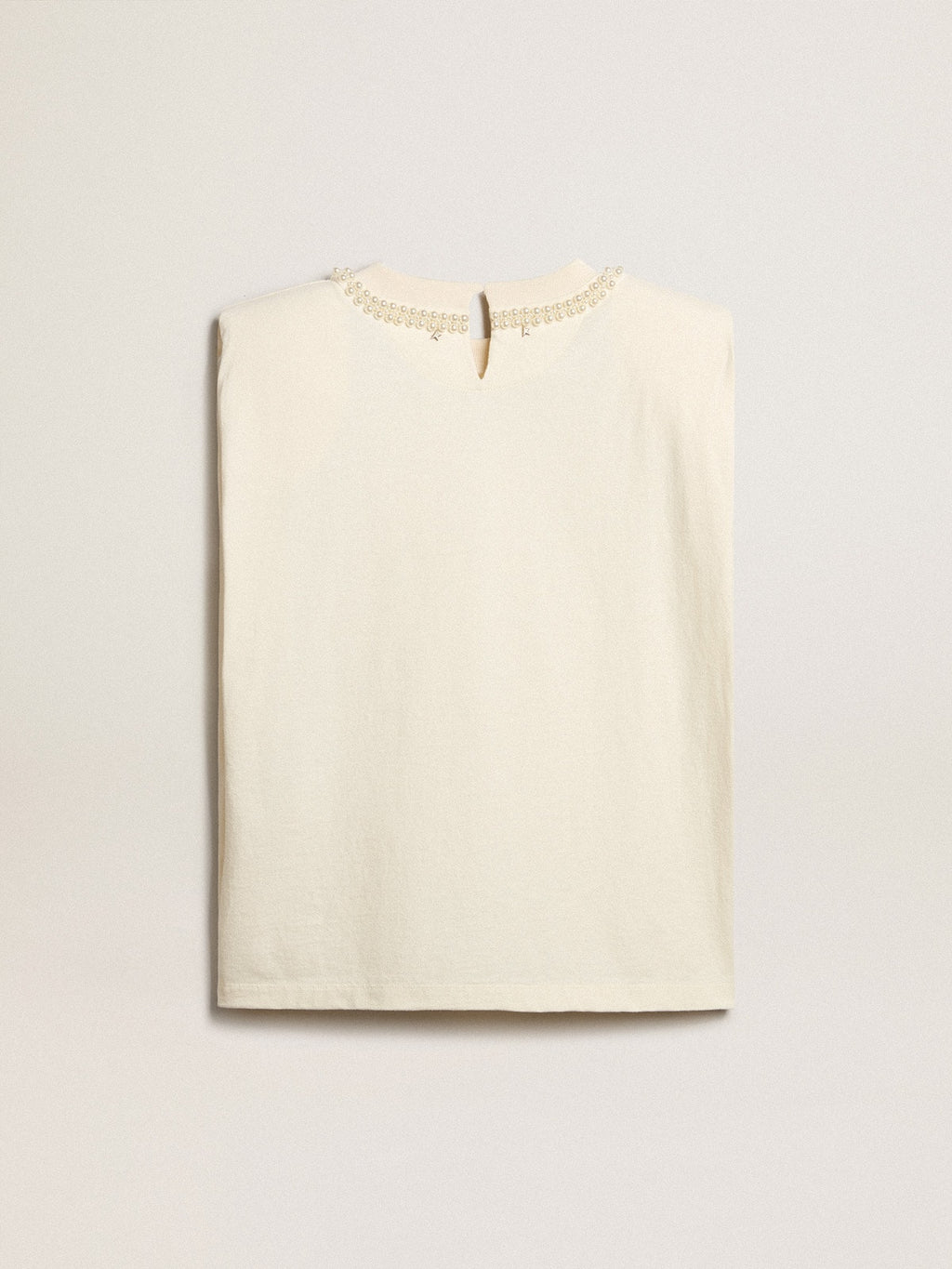 Aged white sleeveless T-shirt with pearl embroidery