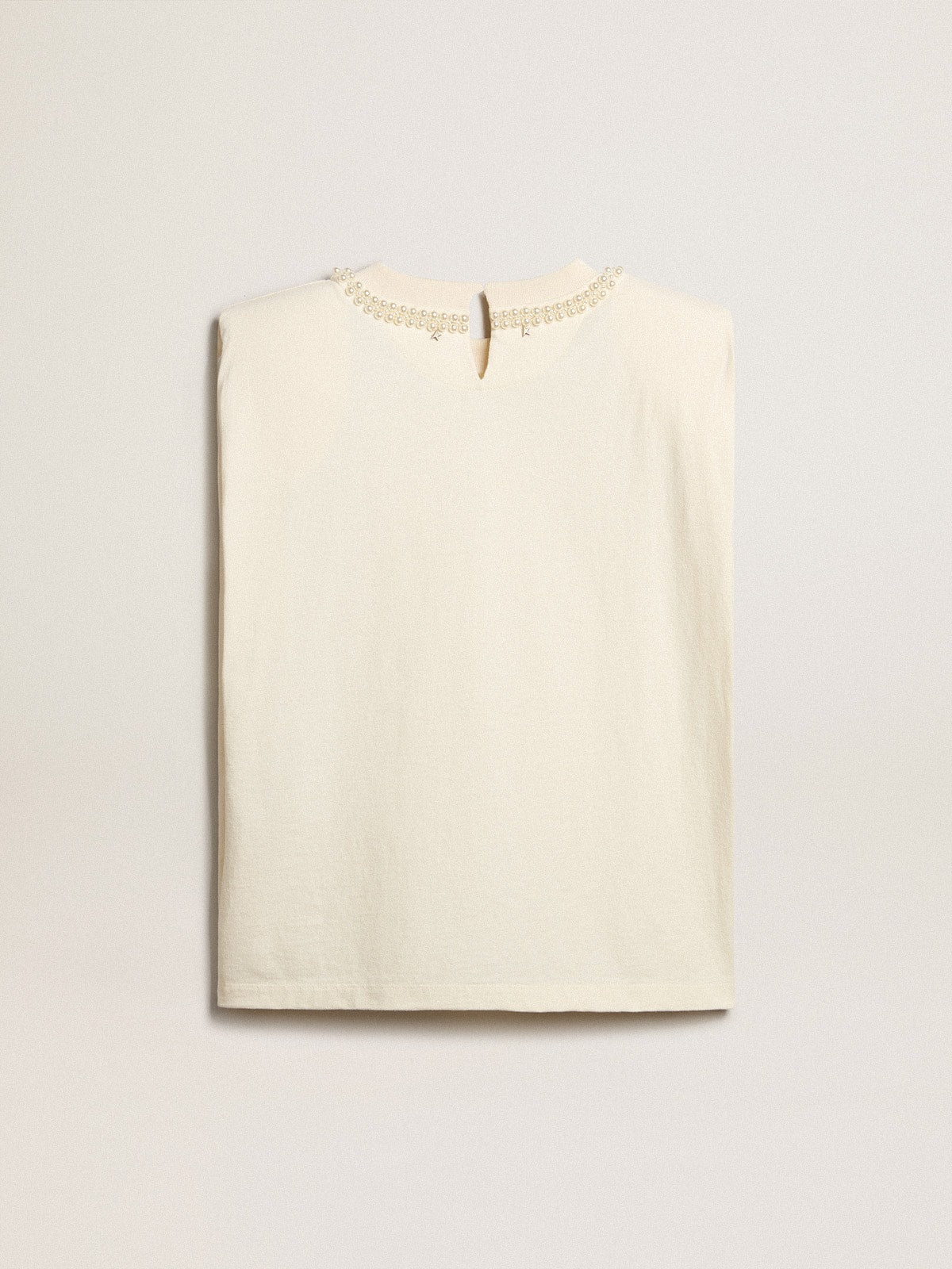 Aged white sleeveless T-shirt with pearl embroidery