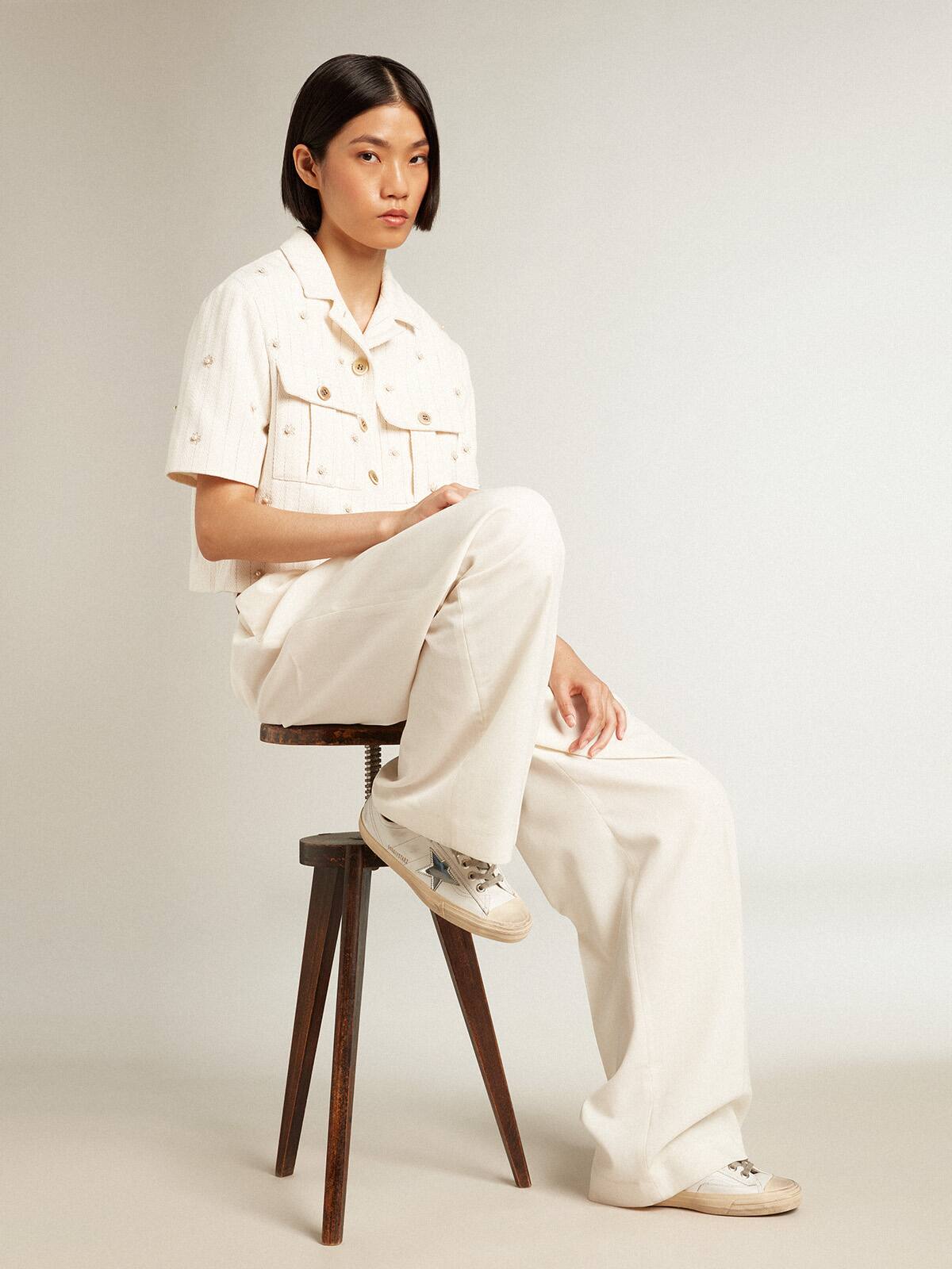 Aged white jacket in pinstripe cotton with all-over floral embroidery