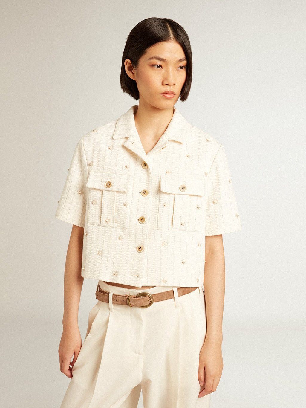 Aged white jacket in pinstripe cotton with all-over floral embroidery