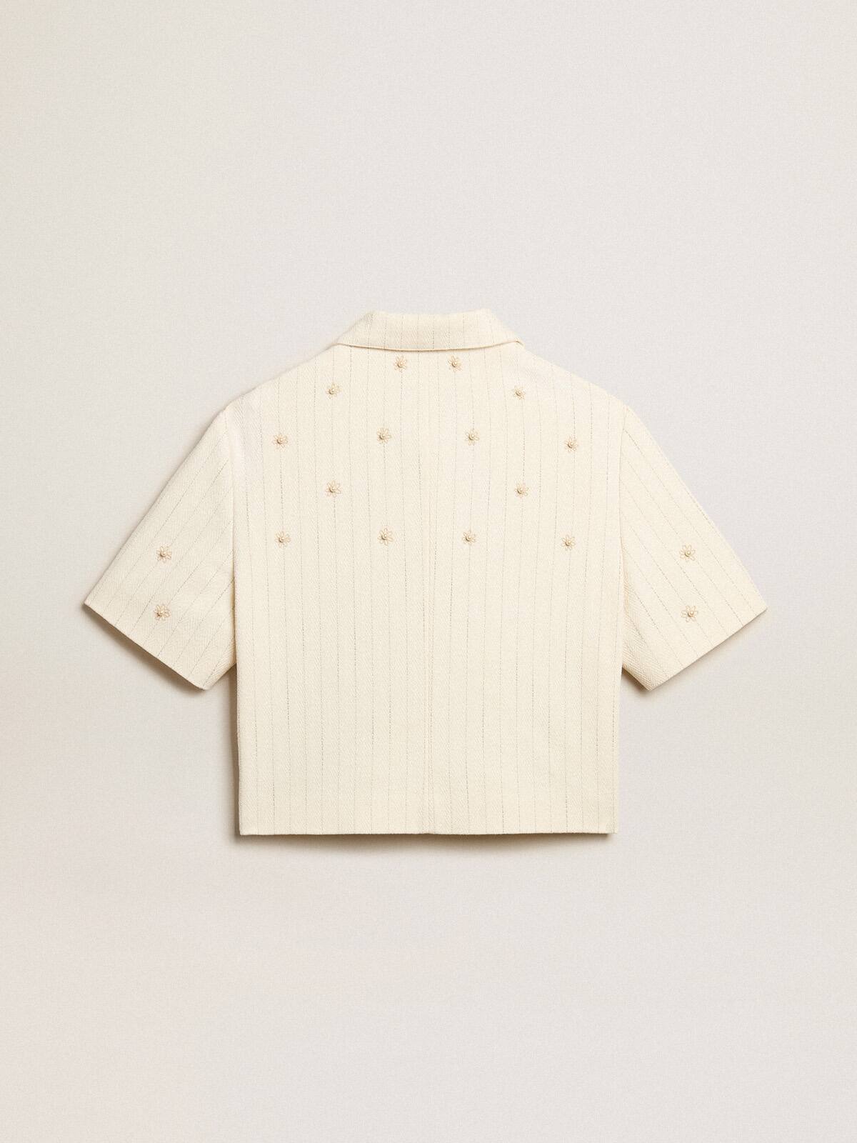 Aged white jacket in pinstripe cotton with all-over floral embroidery