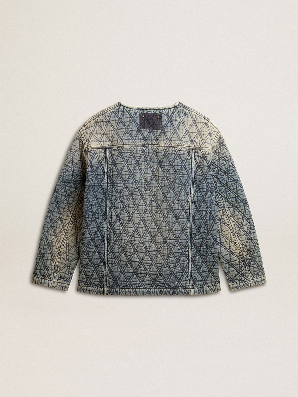 Women's blue quilted jacket in cotton denim with distressed finish