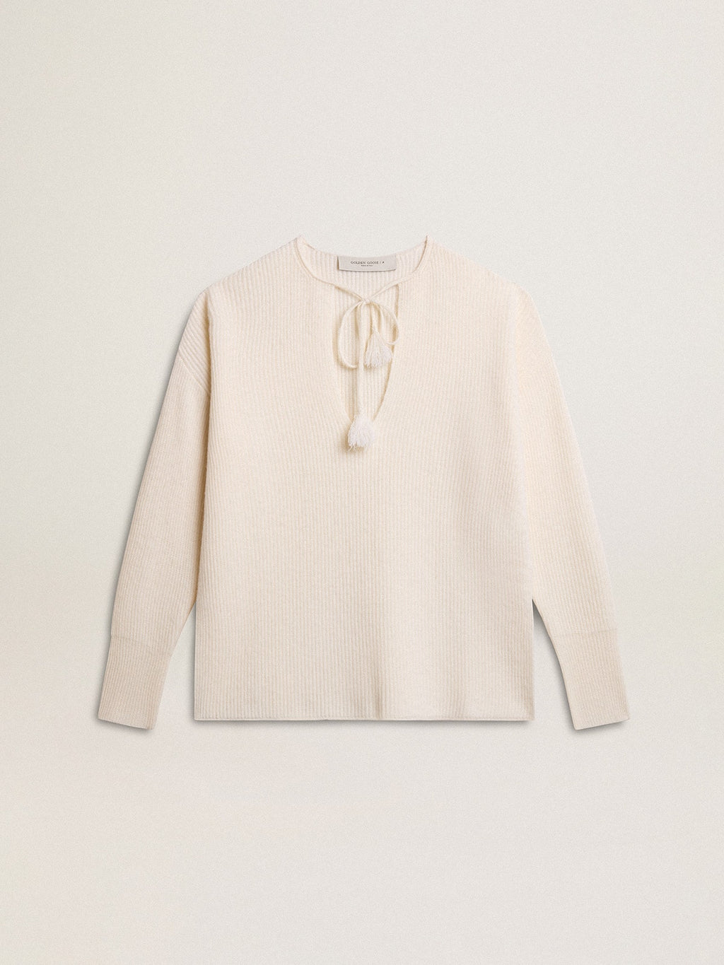 Ribbed wool sweater with V neck and drawstring with tassels
