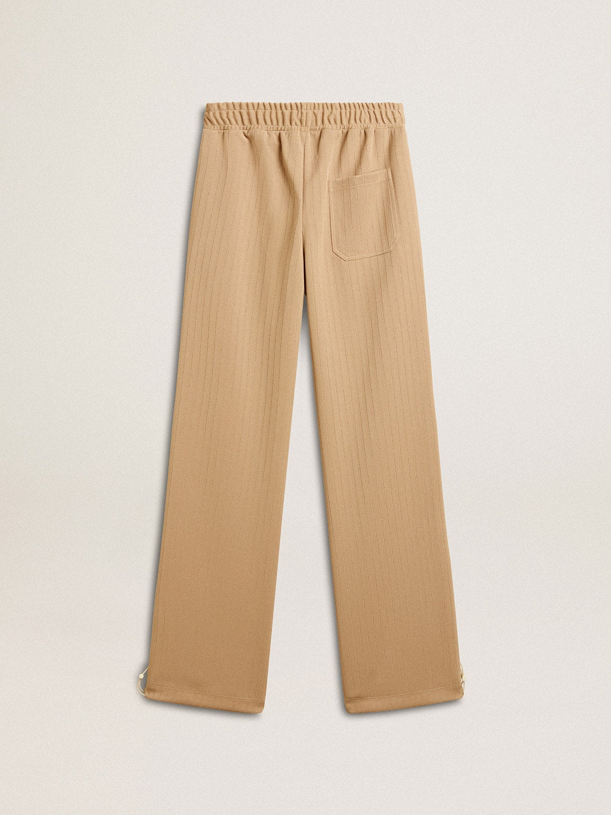 Women’s light beige joggers with white logo