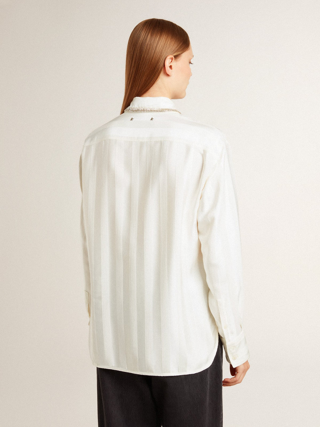 Women's shirt with a vertical striped pattern and crystal embroidery