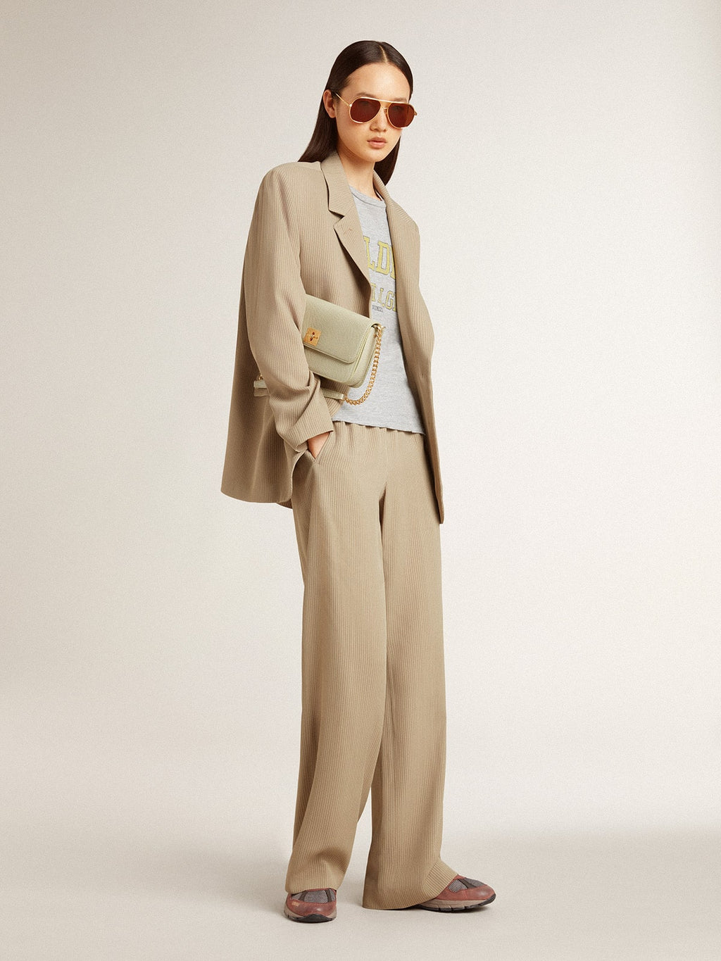 Women's beige pinstripe single-breasted jacket with an oversized fit