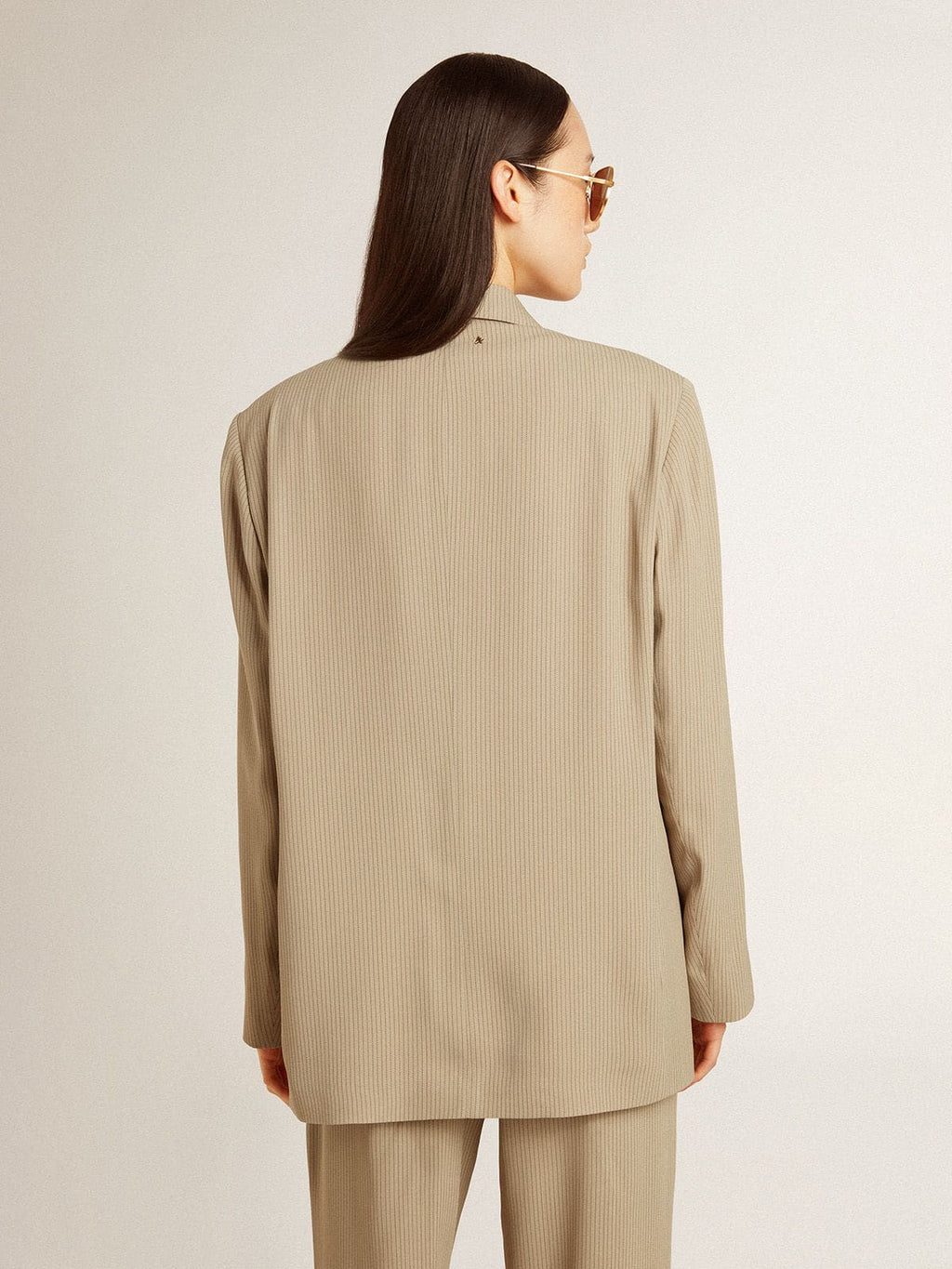 Women's beige pinstripe single-breasted jacket with an oversized fit