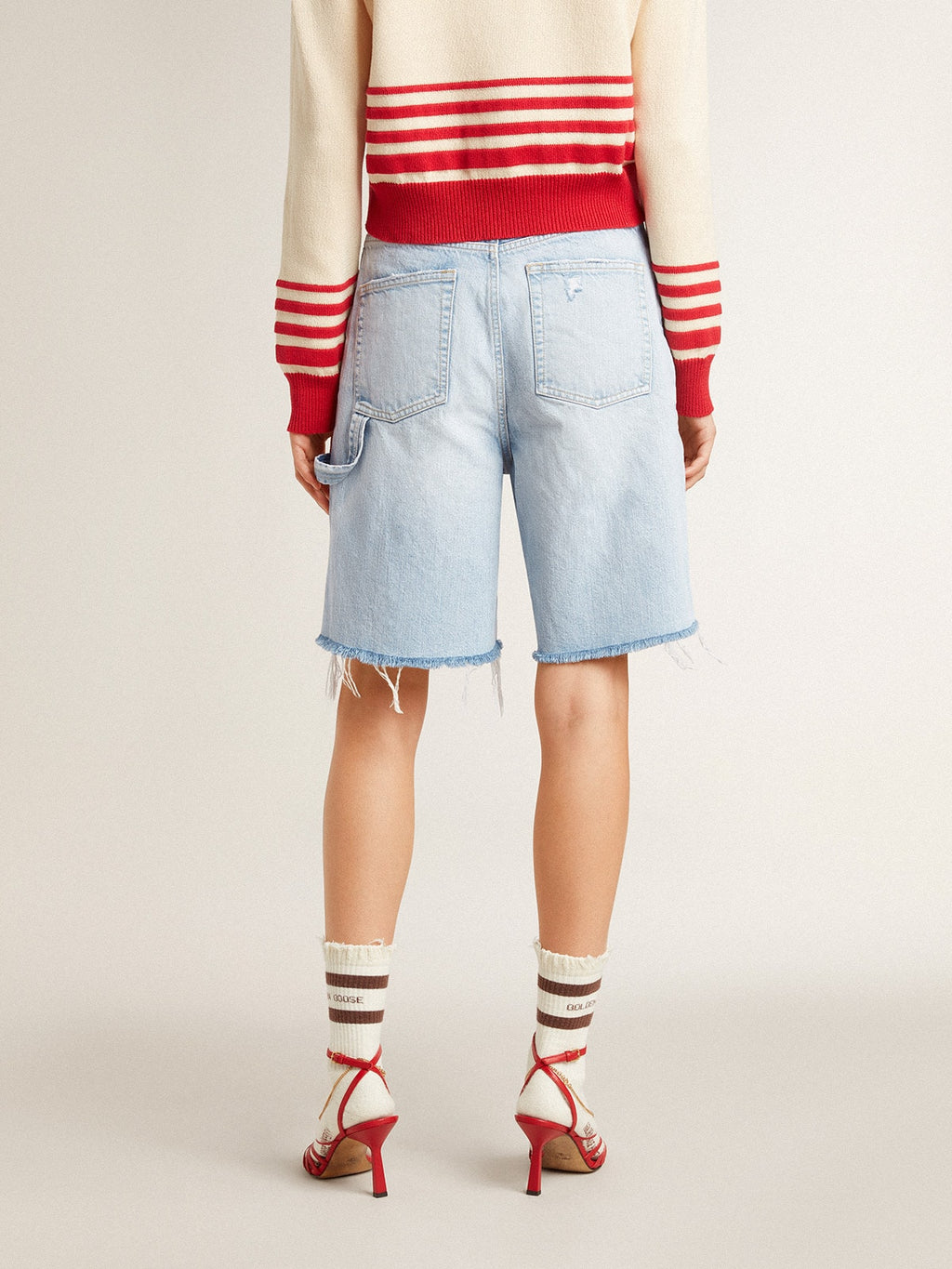 Women's Bermuda shorts in lived-in effect denim