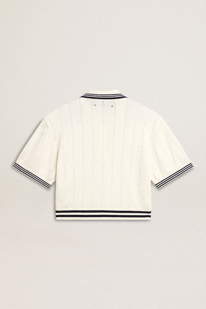 Women's cropped worn-white cotton polo shirt with blue ribbing