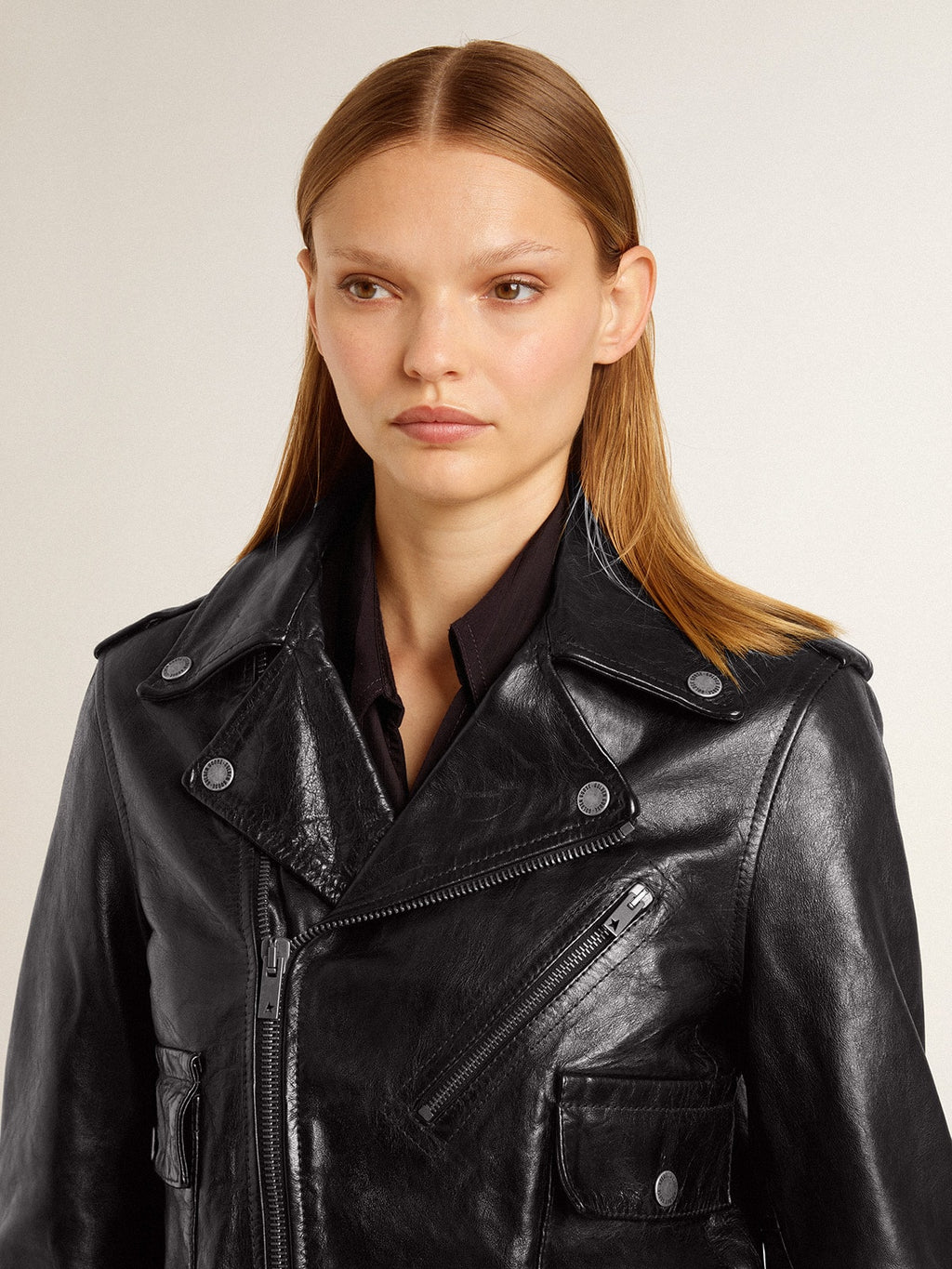 Women’s black leather biker jacket with glossy effect