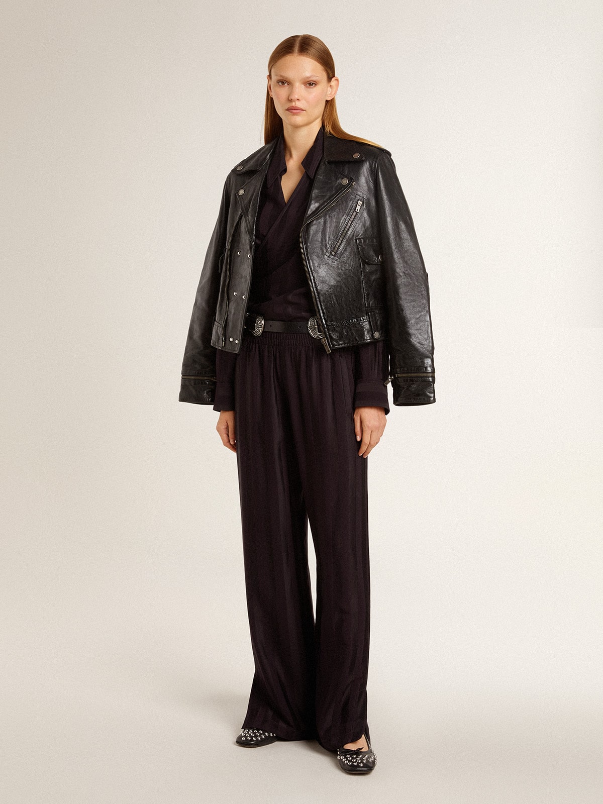 Women's black shirt with vertical stripes and side knot closure