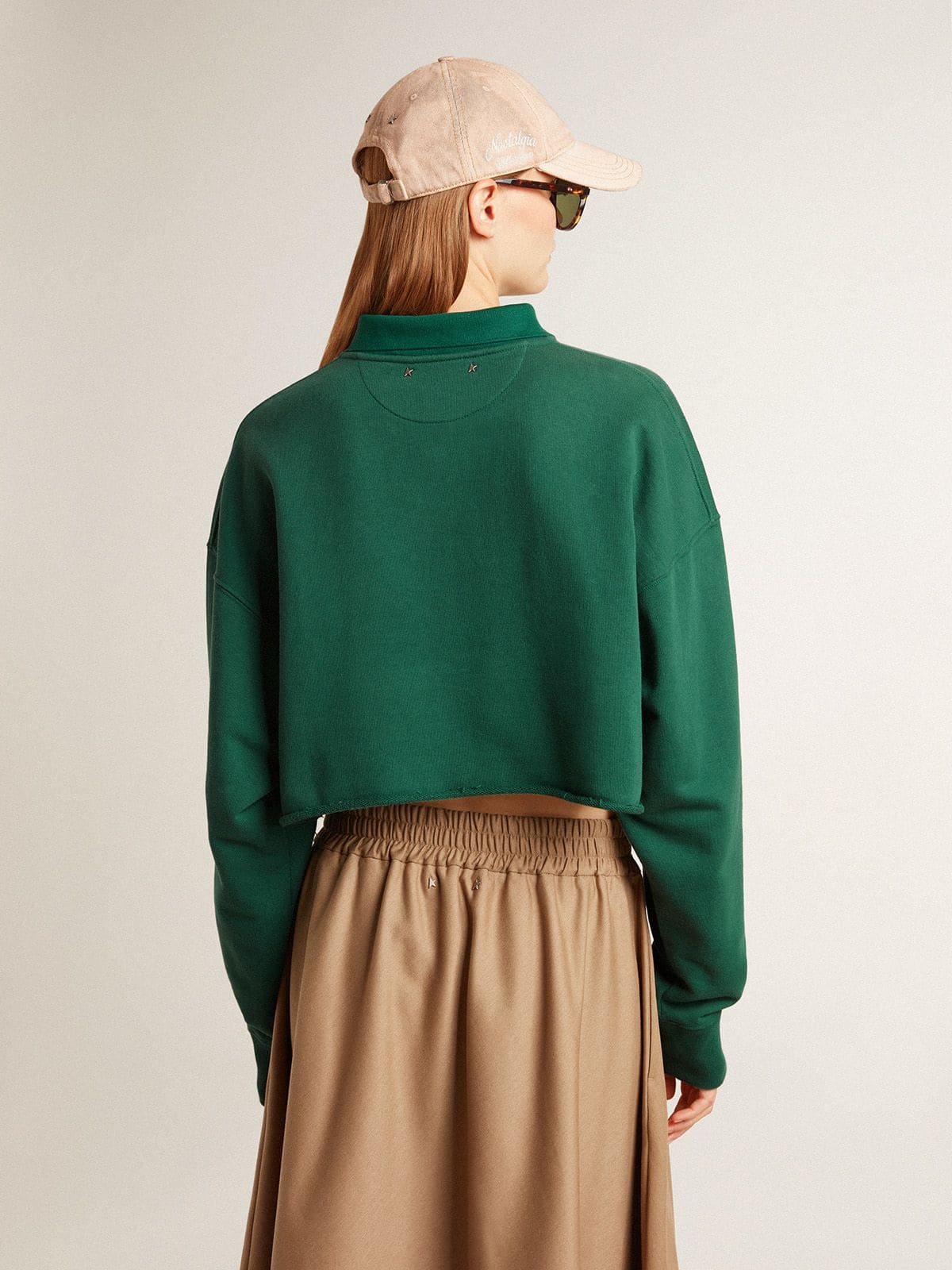 Women's green cropped polo sweatshirt with print