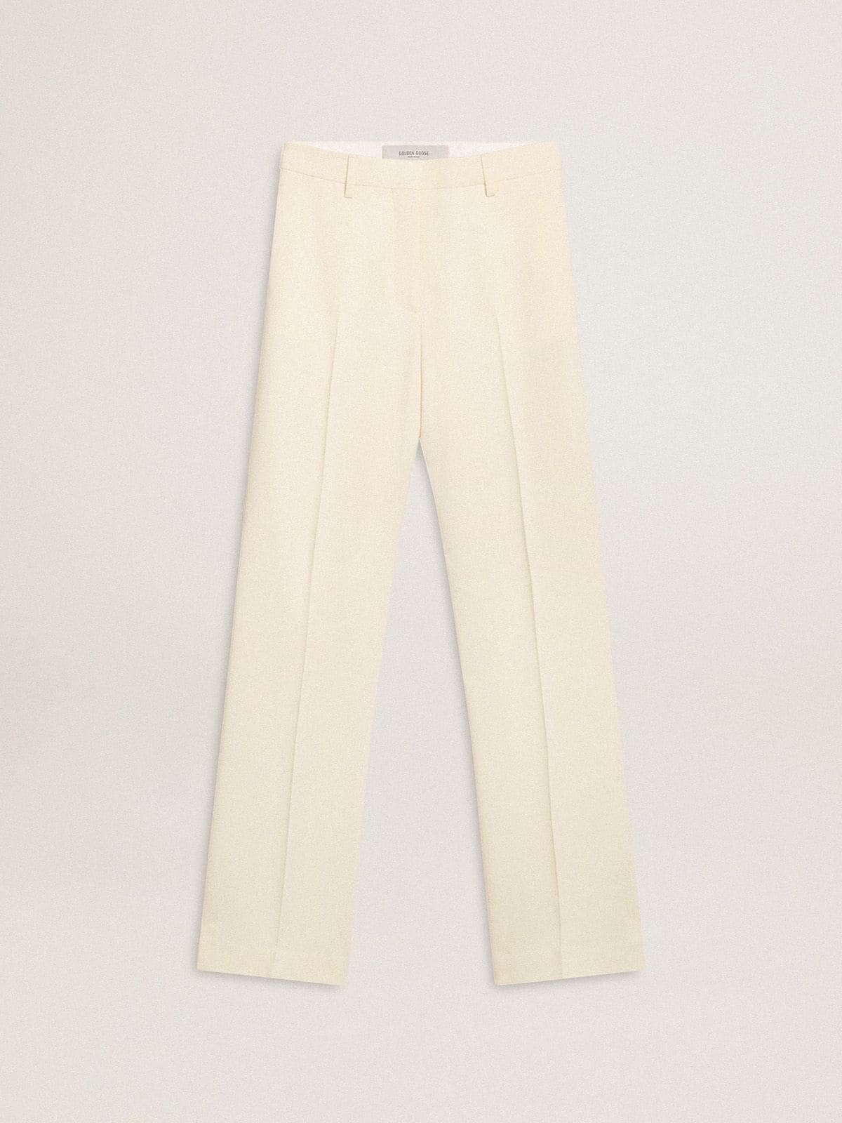 Women's loose pants in worn-white tailored fabric