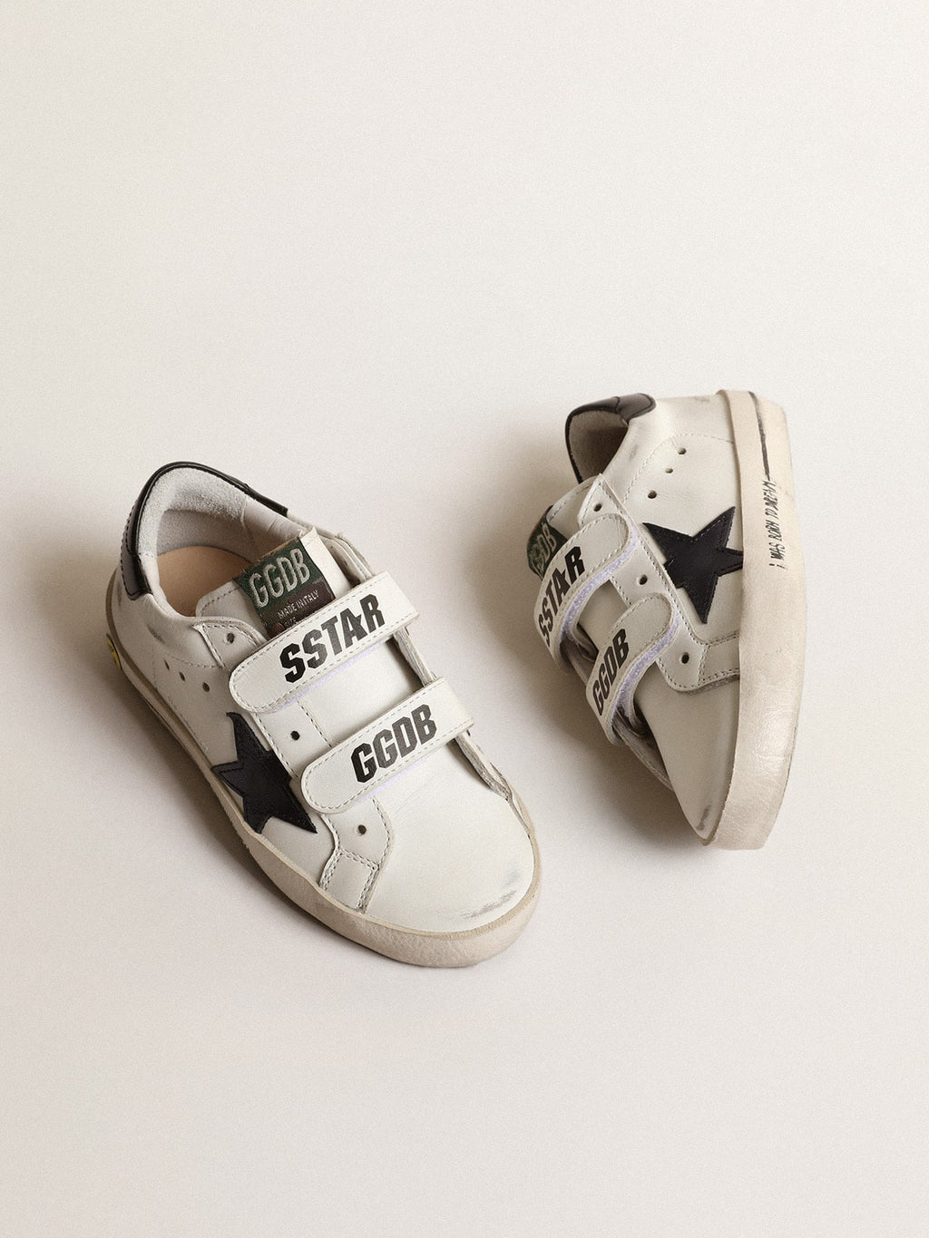 Old School Young with metallic leather star and black heel tab