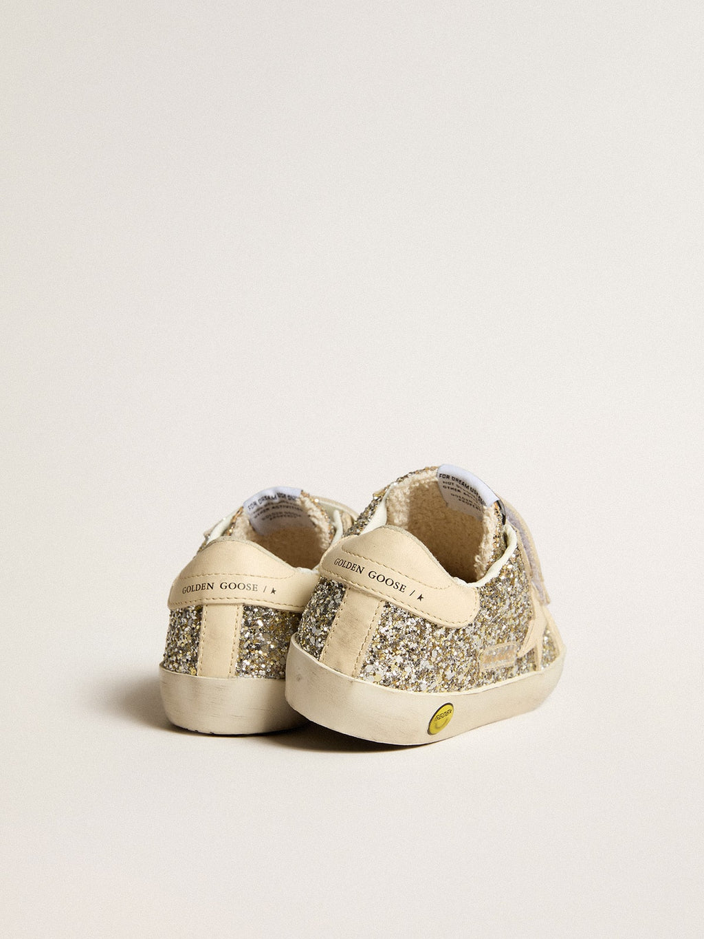 Old School Young in platinum glitter with leather star and heel tab