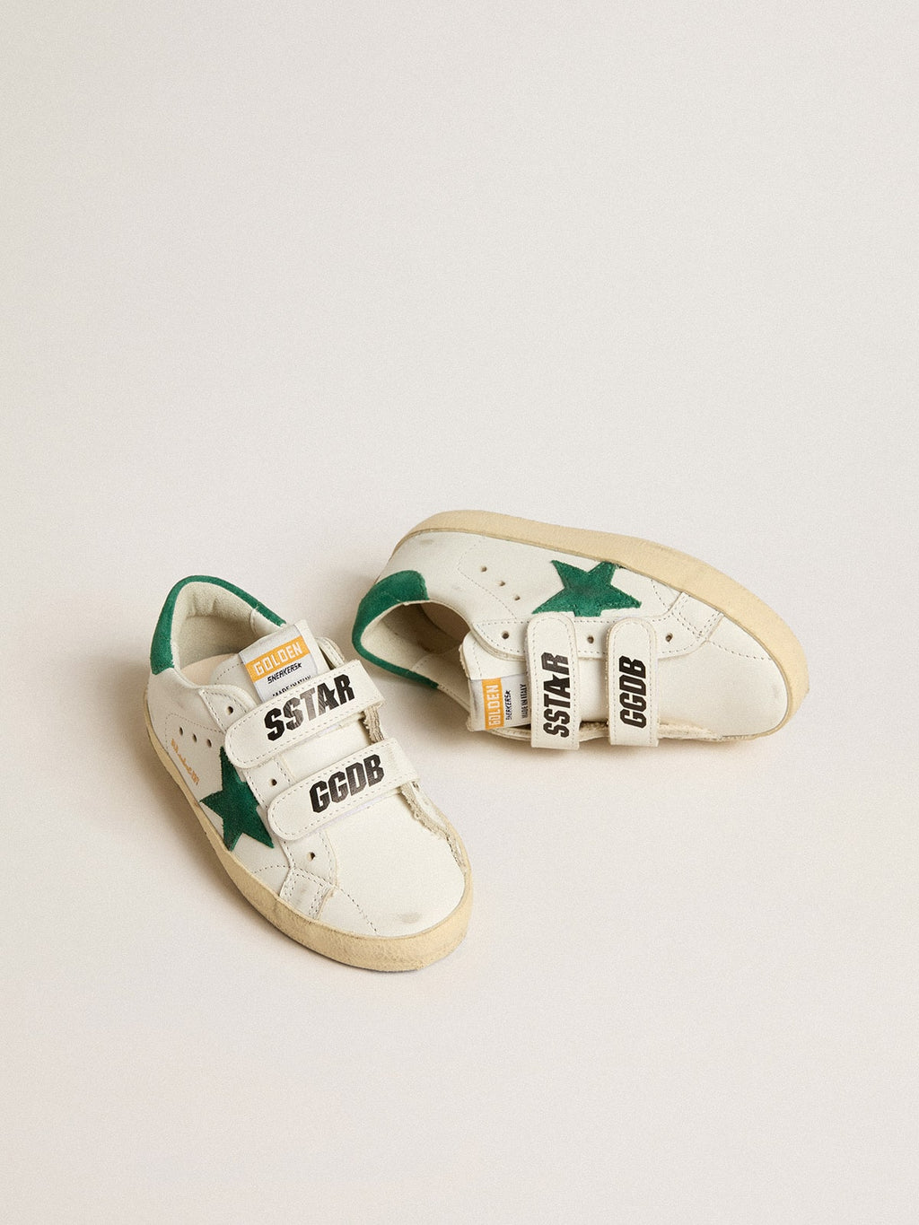 Old School Young with green suede star and heel tab