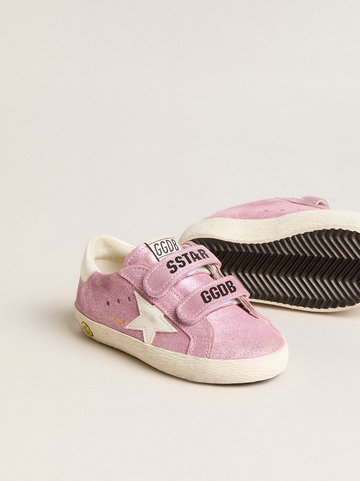 Young Old School in metallic pink suede with white leather star and heel tab
