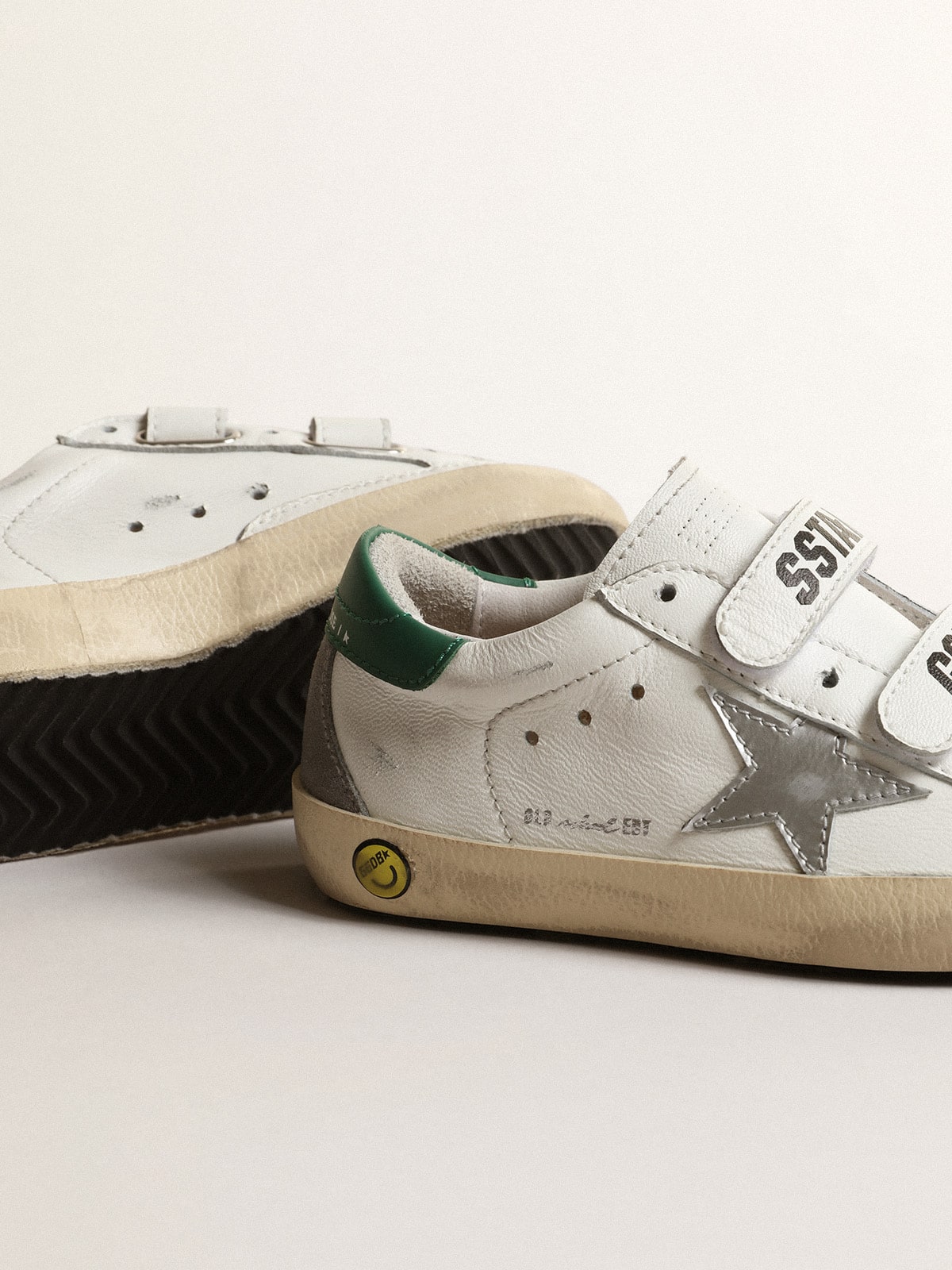 Old School Young with metallic leather star and green heel tab