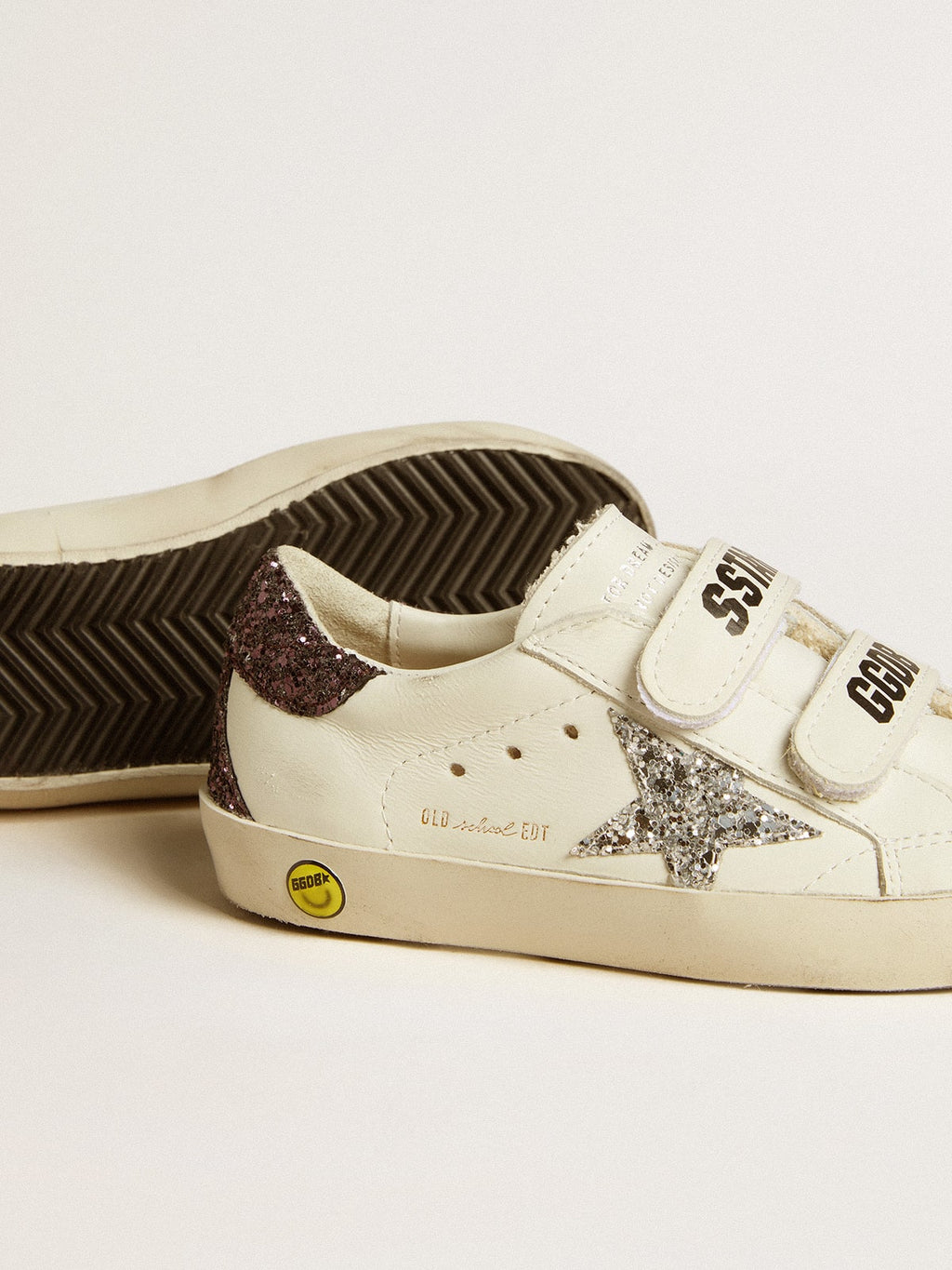 Old School Young with silver glitter star and glitter heel tab