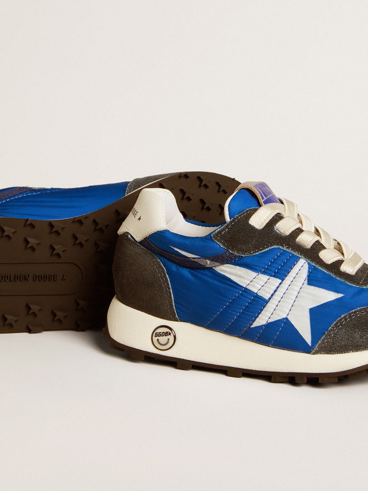 Marathon Young in blue nylon with printed star and leather heel tab