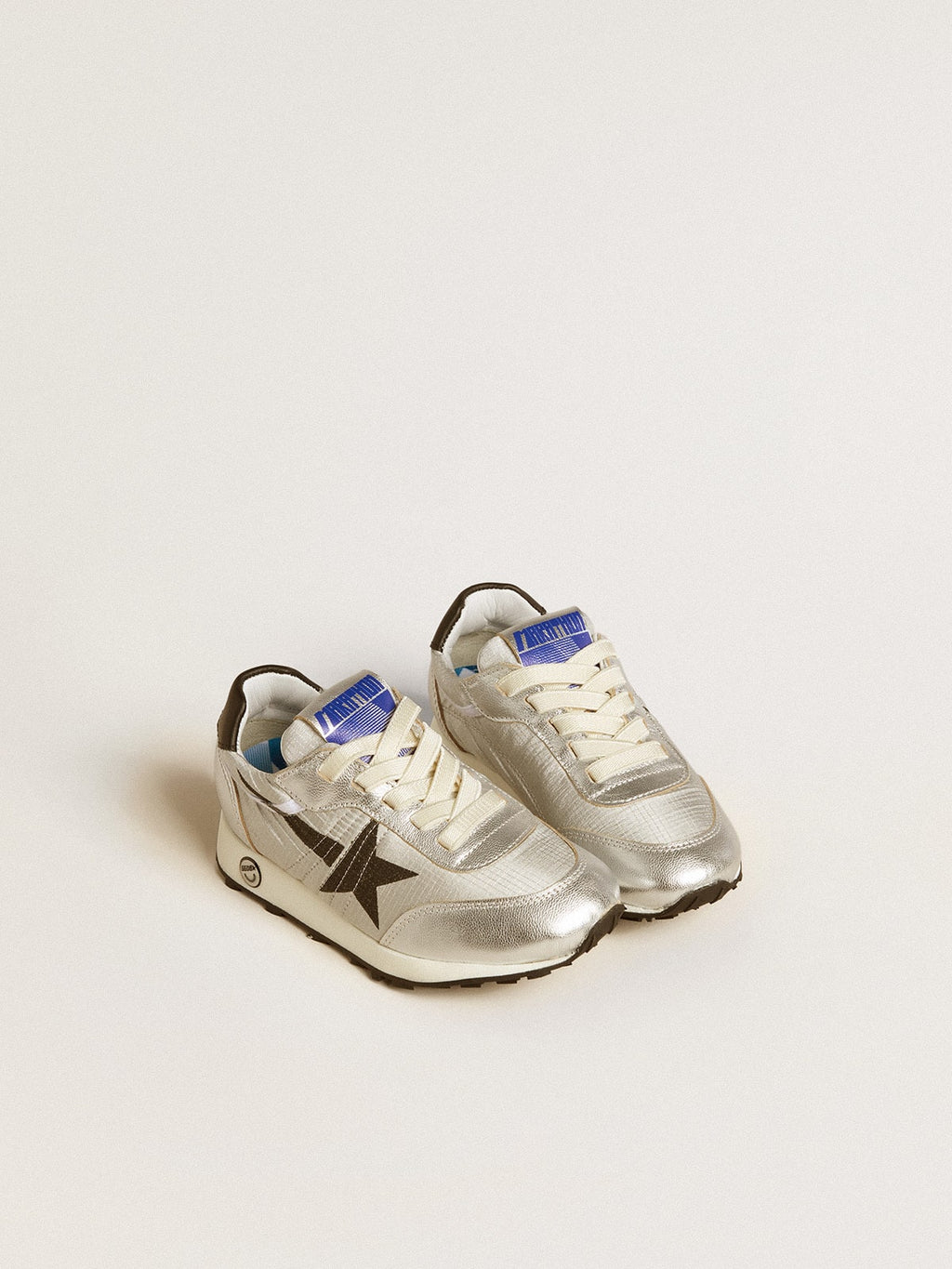 Marathon Young in silver nylon with black star and leather heel tab