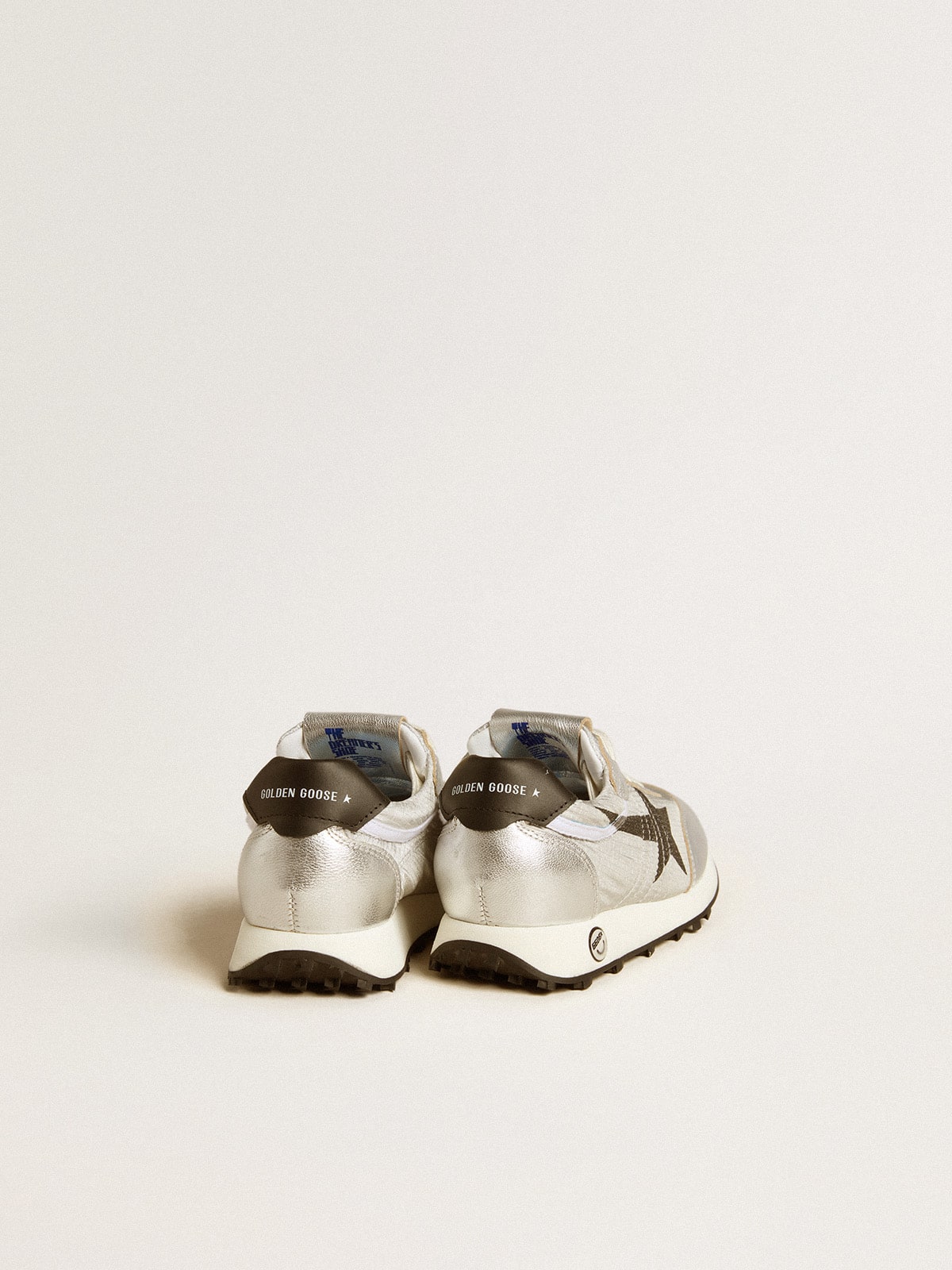 Marathon Young in silver nylon with black star and leather heel tab