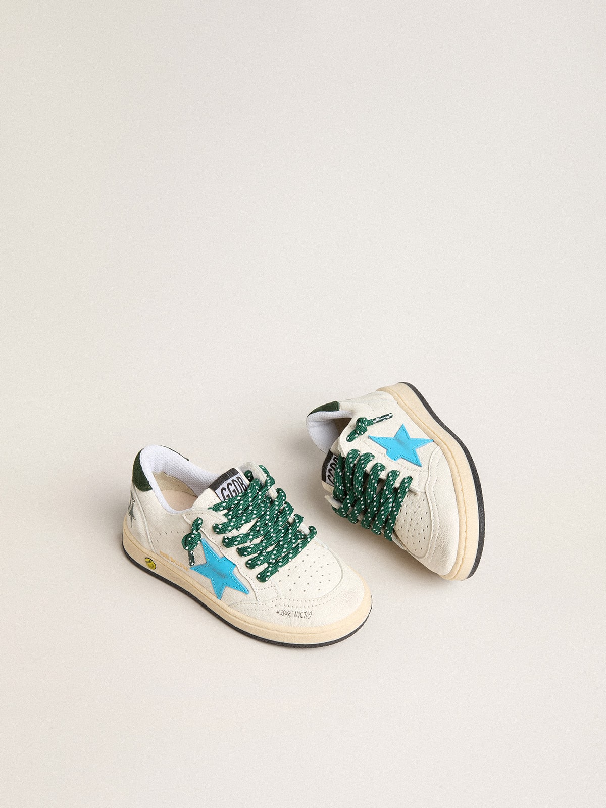 Young Ball Star with turquoise star and green suede heel tab