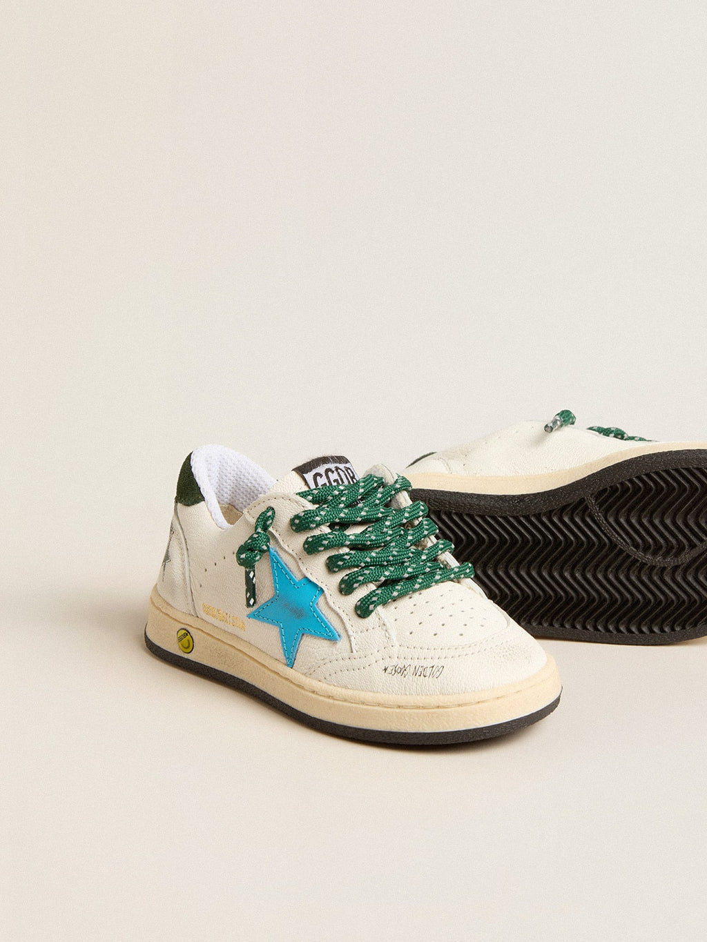 Young Ball Star with turquoise star and green suede heel tab