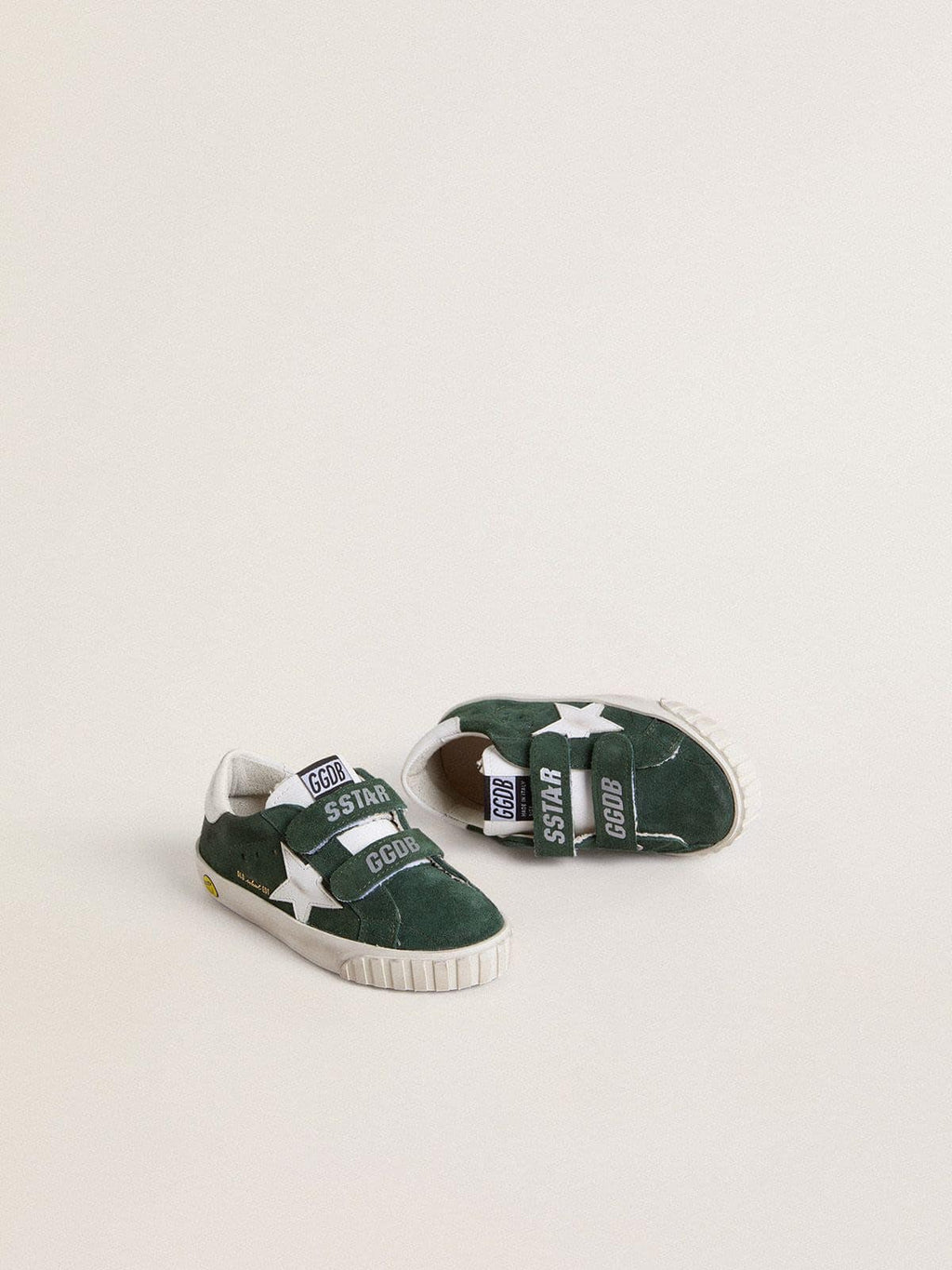 Old School Young in green suede with white leather star and heel tab