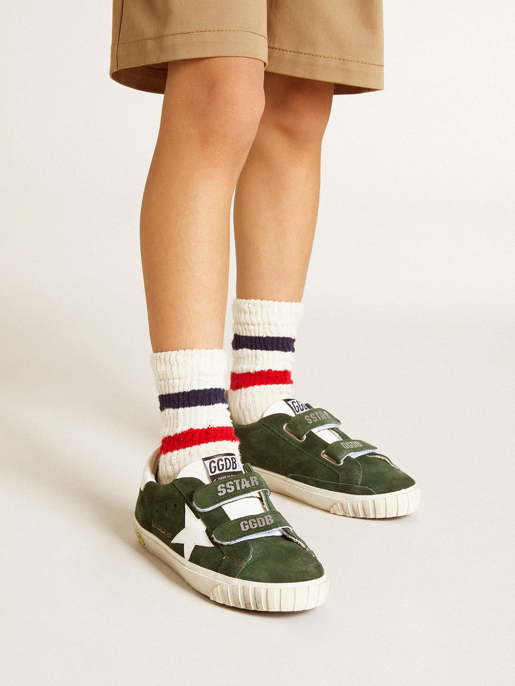 Old School Young in green suede with white leather star and heel tab