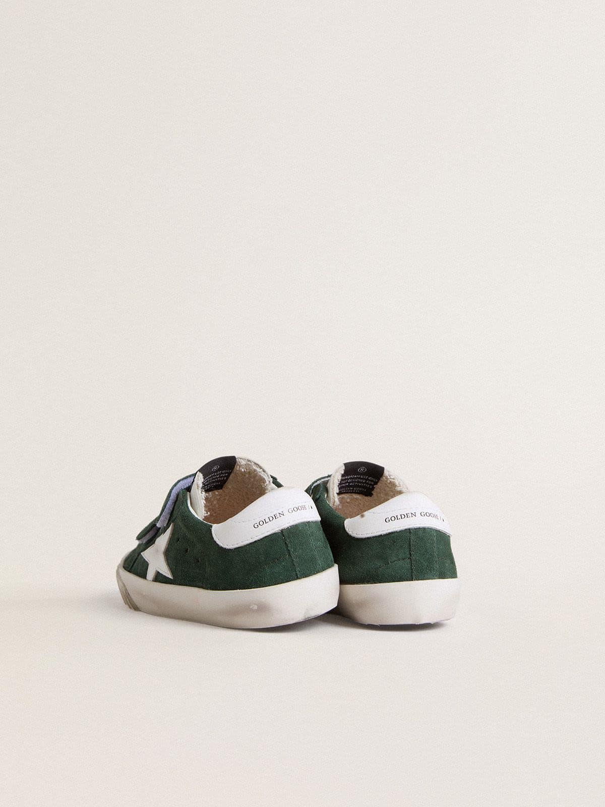 Old School Young in green suede with white leather star and heel tab